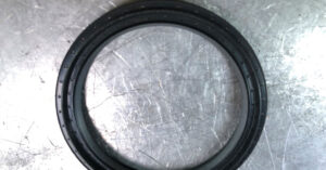 A separate part on a metal surface.