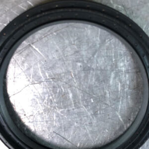 A separate part on a metal surface.