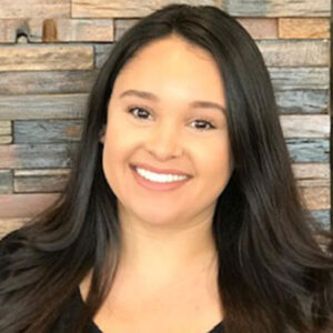 An image of a young woman with dark hair.