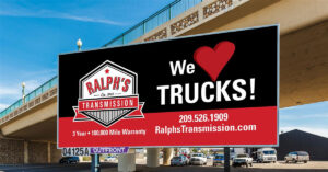 Ralph's Transmission billboard "We Love Trucks."