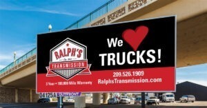Ralph's Transmission billboard "We Love Trucks."