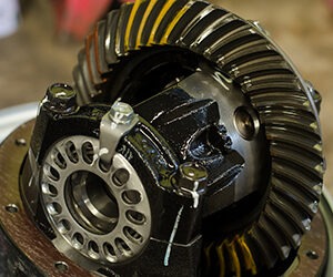 An image of a raw transmission part pulled from a car.