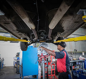 An image of a Ralph's Technician inserting a new transmission.