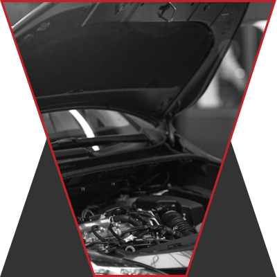 A car has it's hood popped up.