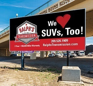 A billboard for Ralph's Transmission.