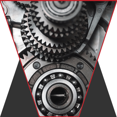 A section of gears in black and white stacked up.