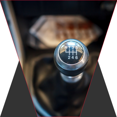 The shifting stick on a manual transmission.