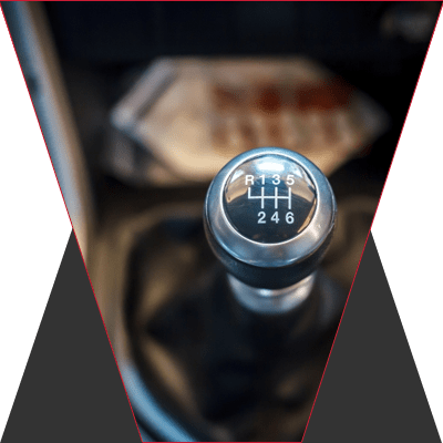 The shifting stick on a manual transmission.