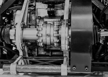 A black and white photo of a transmission in a vehicle.