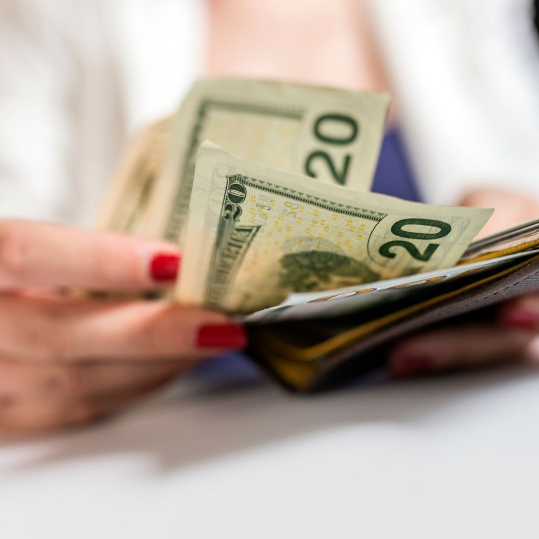 Person counting money