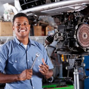 mechanic working on a transmission