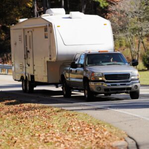 a truck pulling an RV